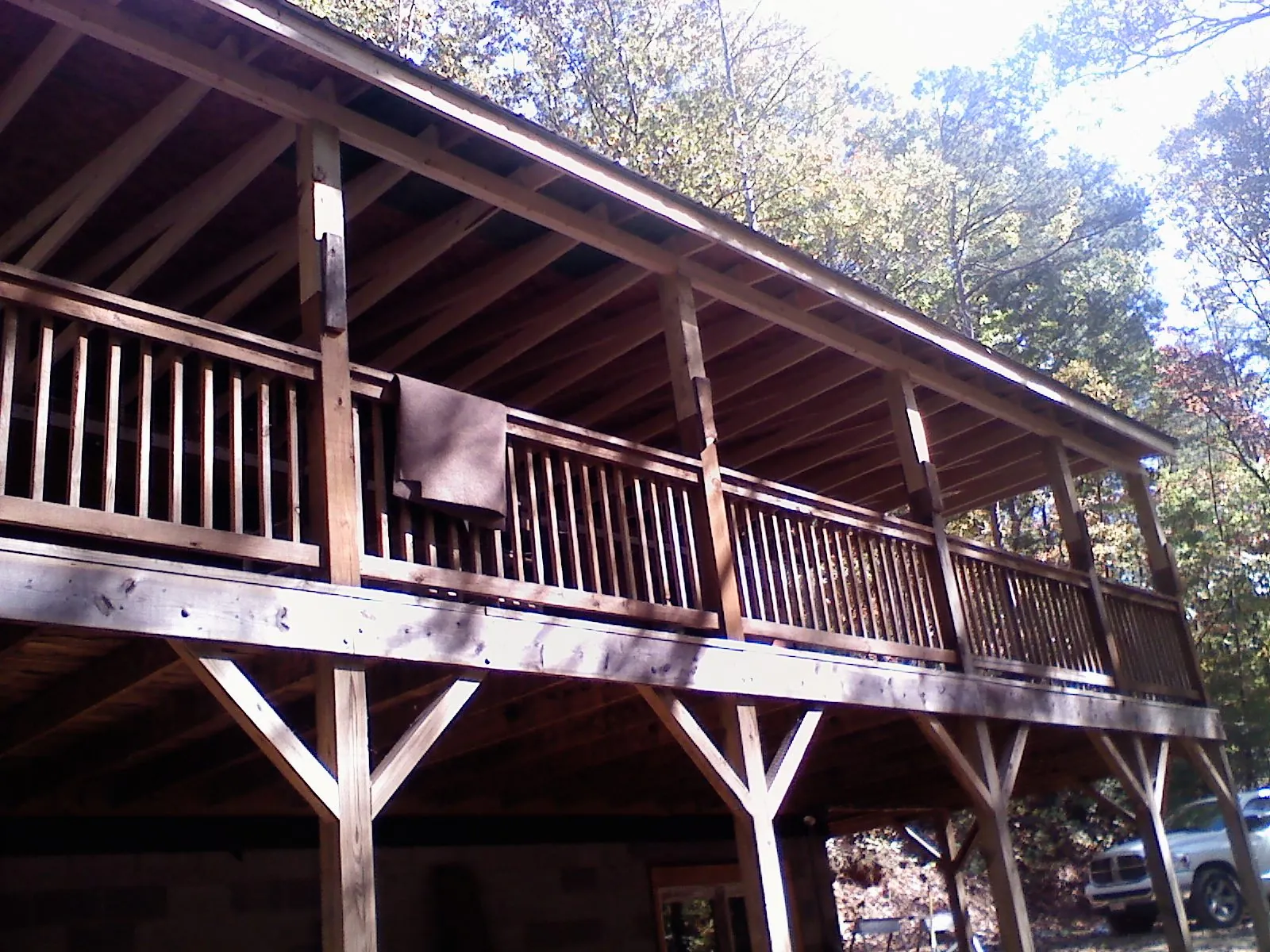 Timber framing under a new elevated porch and deck — Roof Leak Repair in Medicine Bow by Roofing Brothers